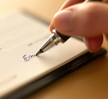 image of signing check